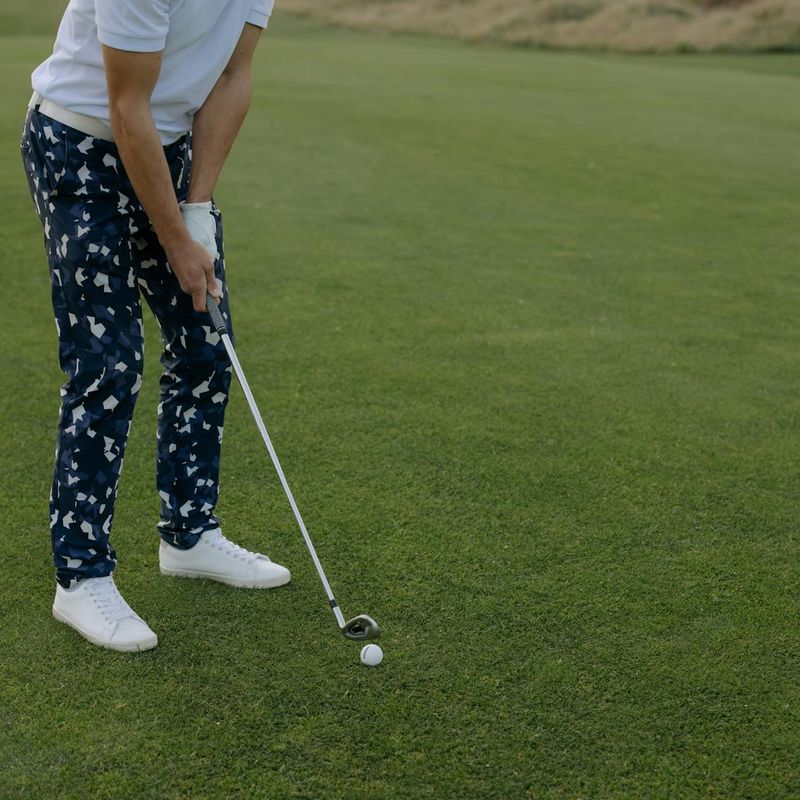 Man in a focused stance preparing for an exercise.